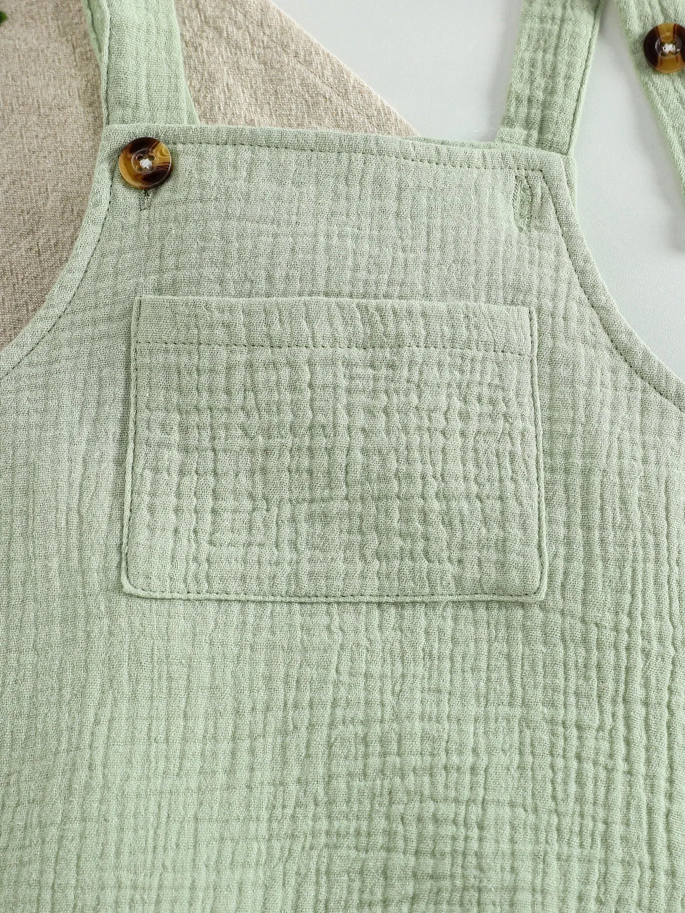 Sleeveless Cotton Muslin Baby Romper with Button Straps (0–18M) - Image 4